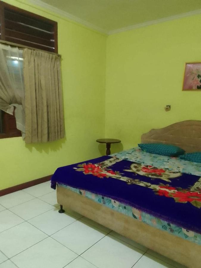 Oyo 93146 Lamin Indah Hotel ปุนจัก ภายนอก รูปภาพ