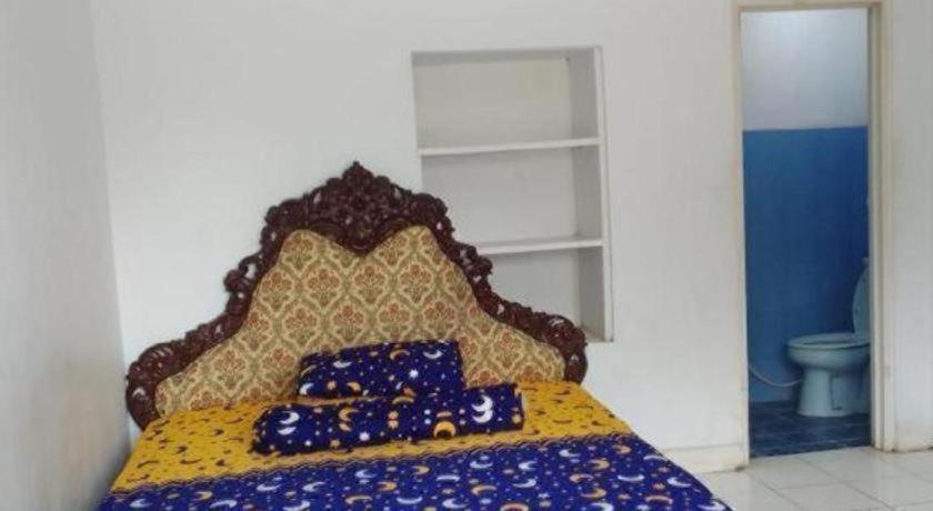 Oyo 93146 Lamin Indah Hotel ปุนจัก ภายนอก รูปภาพ